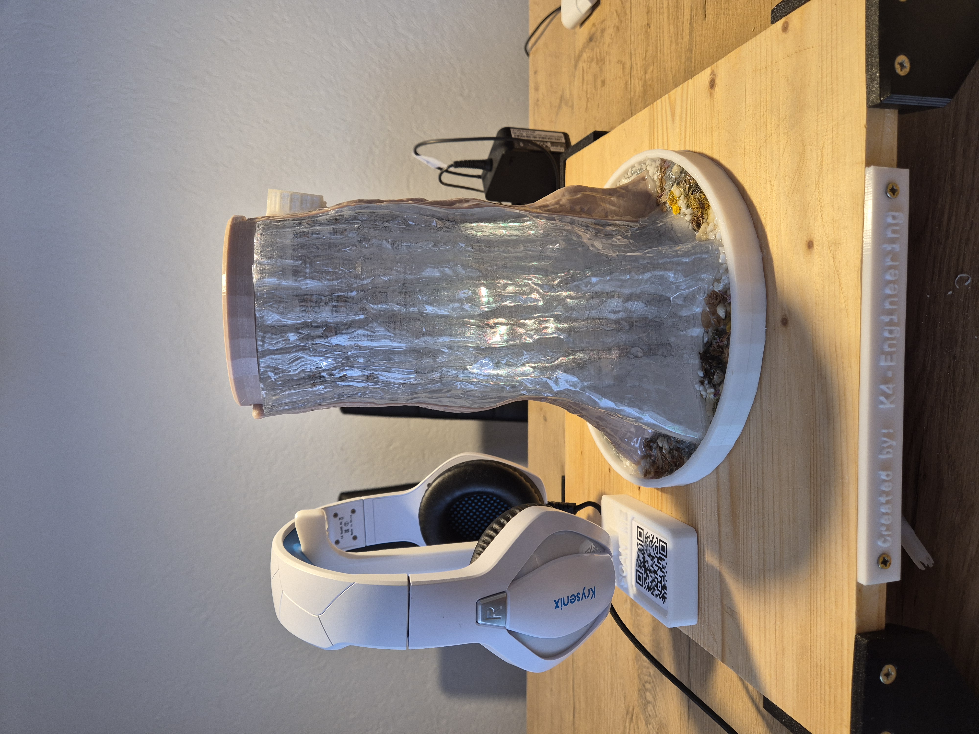Translucent vase-mode trunk â€” sensor electronics housed inside